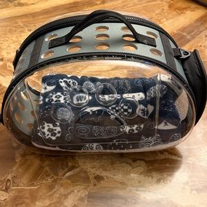 Transparent Black and Gray critter carrier was used for stuffed animals only